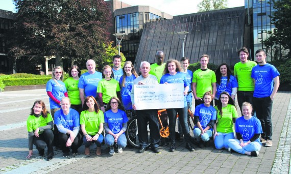 Ilyana Keohane (centre) and other psychology students and lecturers presenting Pieta House’s Johnny Togher (centre) with a fundraising cheque for €4,300 last month