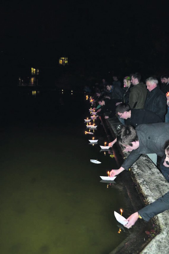 Boats are set out into the water for Out in UL’s Light for Life SoUL Arts Fest event