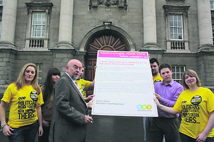 Former Minister for Eduction, Ruairi Quinn signing the USI Election Pledge in February 2011 prior to the 2011 General Election. Photo: Eduction Matters